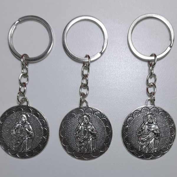 Llavero metal corazon de Jesus en relieve borde dorado-13915