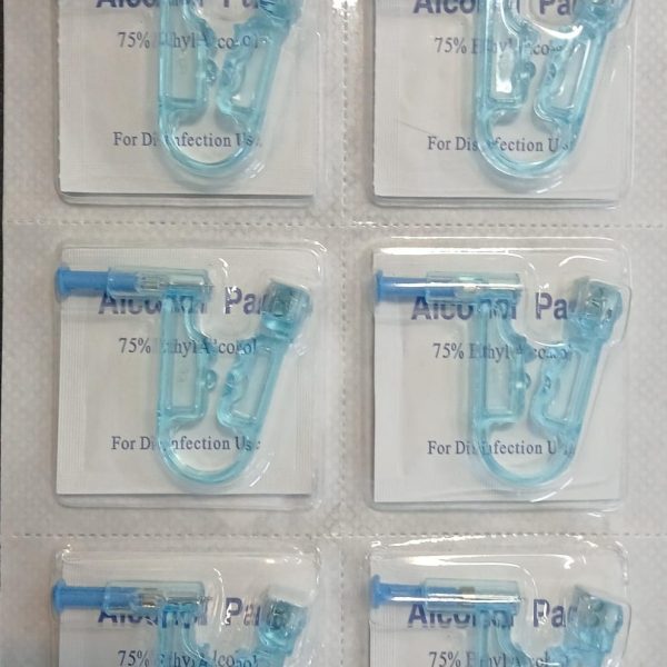 Perforador de orejas +pad de alcohol x 6u - 1608